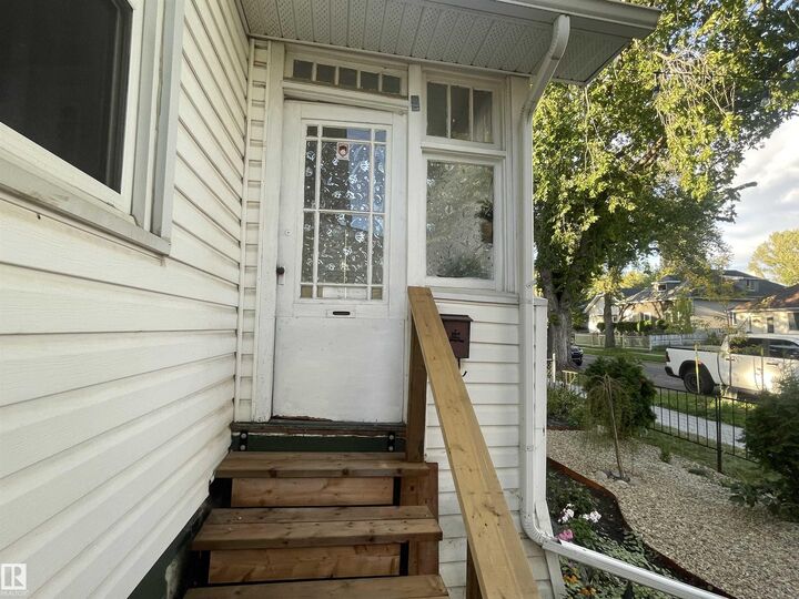 Property Photo:  11230 96 Street NW  AB T5G 1S9 
