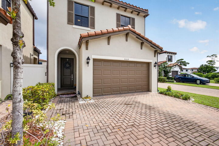 Property Photo: 4004 Screw Pine Cove FL 33410
