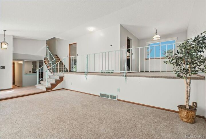 Property Photo:  7724 Parfet Street  CO 80005 
