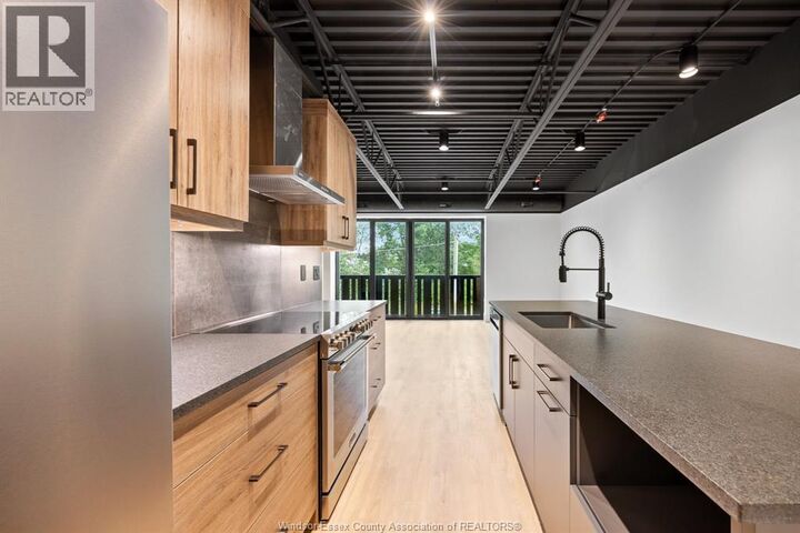 Property Photo:  3850 Dougall 202  ON N9G 1X2 