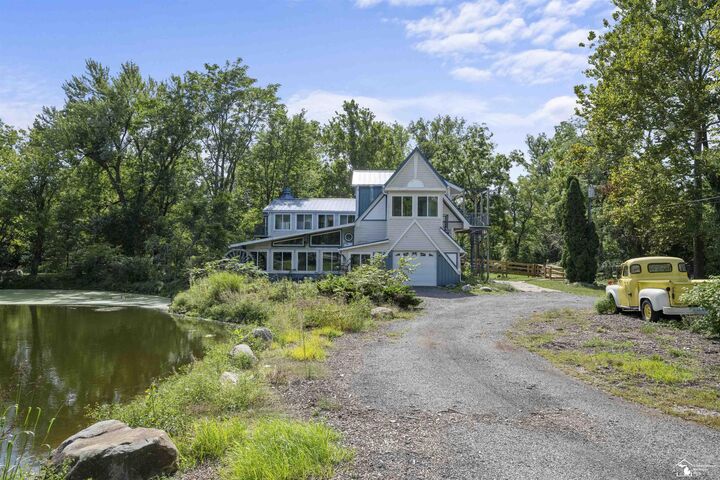 Property Photo:  7977 N Custer Road  MI 48162 