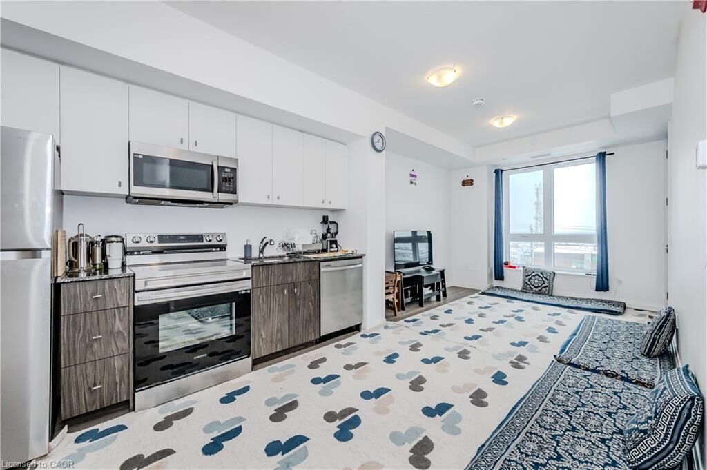 Property Photo:  101 Golden Eagle Road 411  ON N2V 1C3 