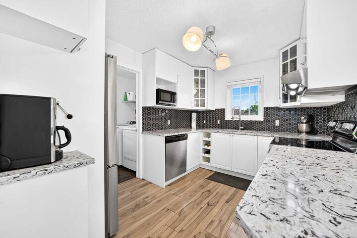 Property Photo:  7171 Coach Hill Road SW 2906  AB T3H 3R7 