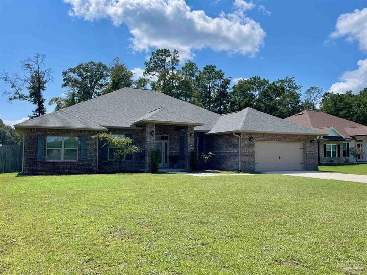 Property Photo:  6506 Cedar Key Dr  FL 32570 