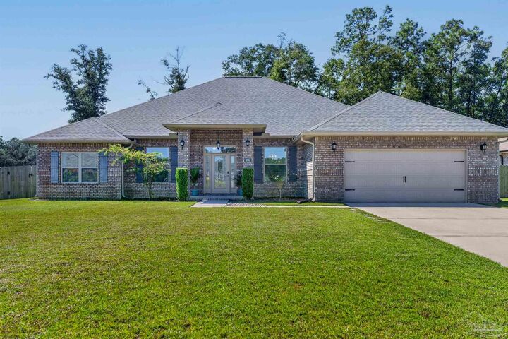 Property Photo: 6506 Cedar Key Dr FL 32570