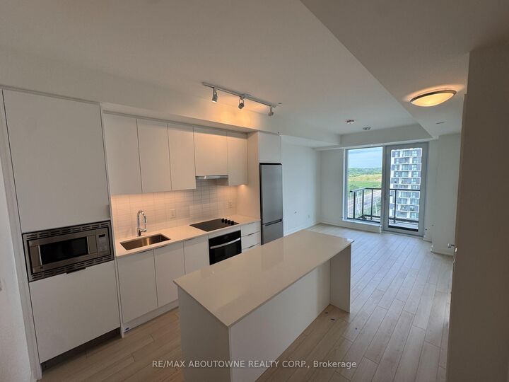 Property Photo:  3079 Trafalgar Road 906  ON L6H 8C5 
