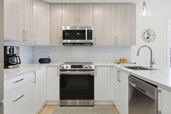 Property Photo:  7098 Wallace Dr #301  BC V8M 1E9 