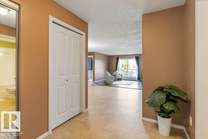 Property Photo:  9910 107 Street 307  AB T8R 0A3 
