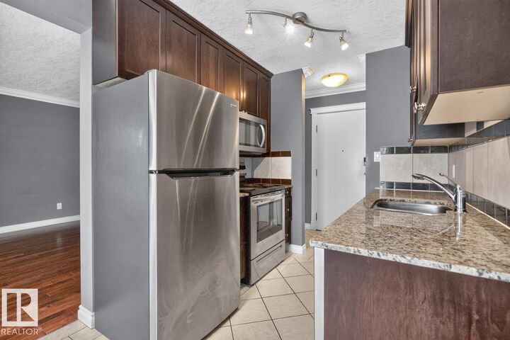 Property Photo:  10625 83 Avenue NW 402  AB T6E 2E3 