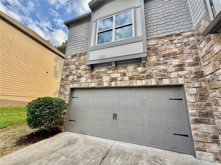 Property Photo:  5190 Amberland Square  GA 30349 