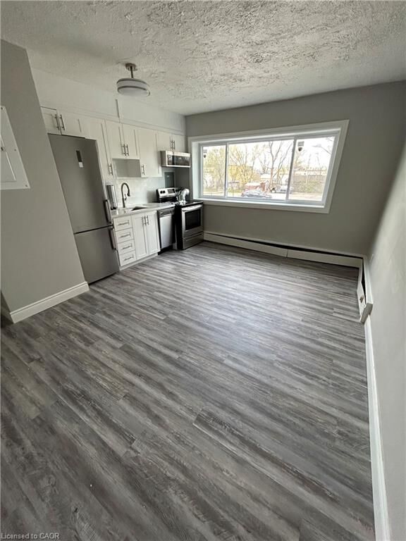 Property Photo:  385 Melvin Avenue 205  ON L8H 2K6 