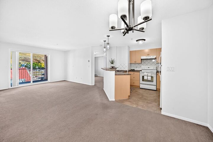 Property Photo:  505 Railway Street W 1316  AB T4C 2K9 