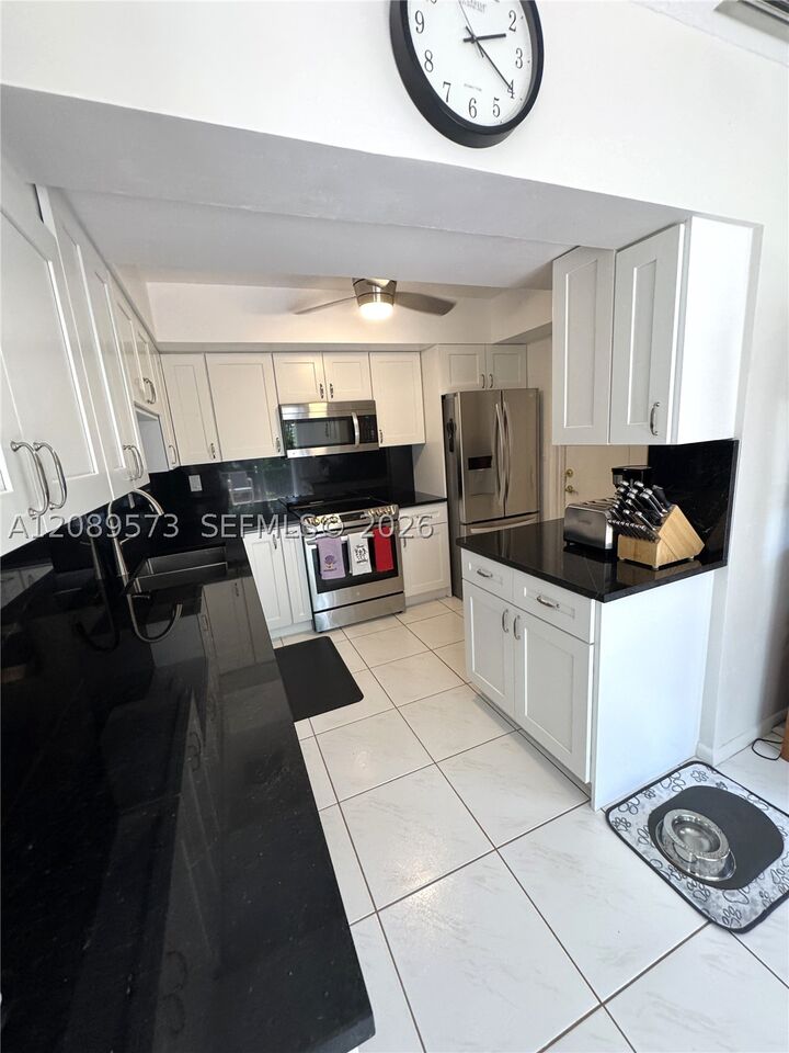 Property Photo:  7190 E Tropical Way  FL 33317 