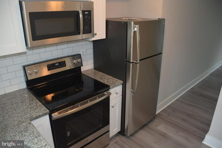 Property Photo:  5029 Hanna Place SE 1  DC 20019 