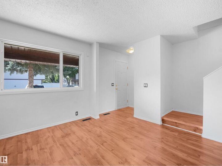 Property Photo:  #22 13833 30 St NW  AB T5Y 2B2 