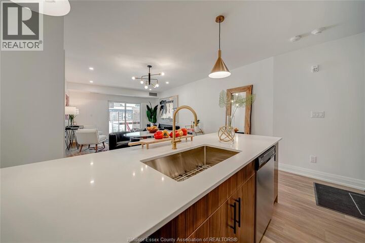 Property Photo:  11957 Tecumseh Road East 101  ON N8R 1L0 