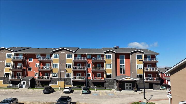 Property Photo: 902 Headmaster Row MB R2G 4K6