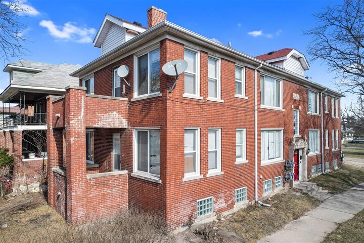 Property Photo: 5032 W Boston Boulevard Unit 5038 MI 48204-1436