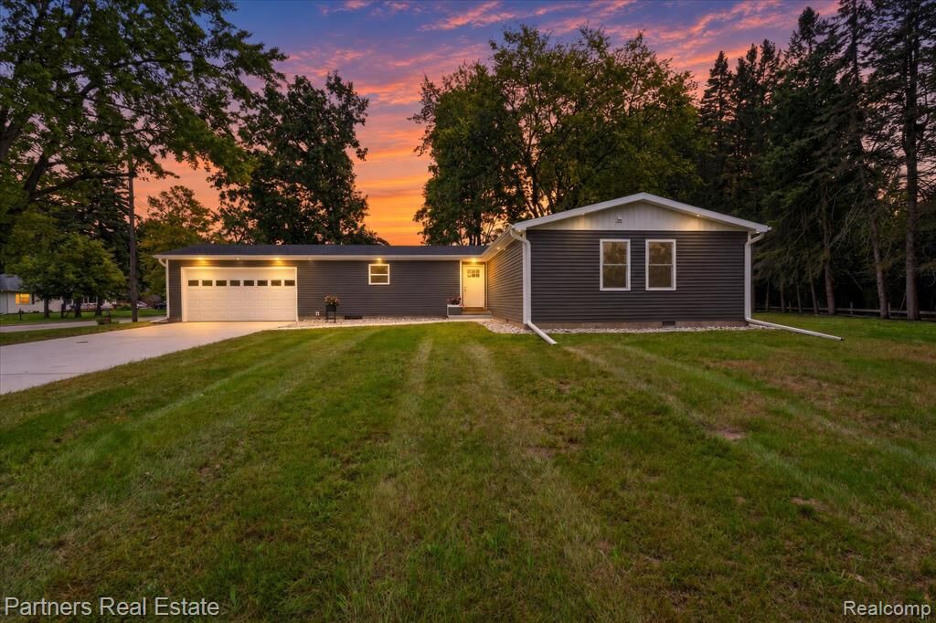 Property Photo: 204 Greenfield Drive MI 48858 2946