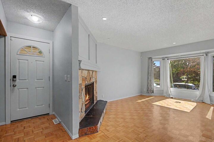 Property Photo:  2444 Woodview Drive SW  AB T2W 4X7 