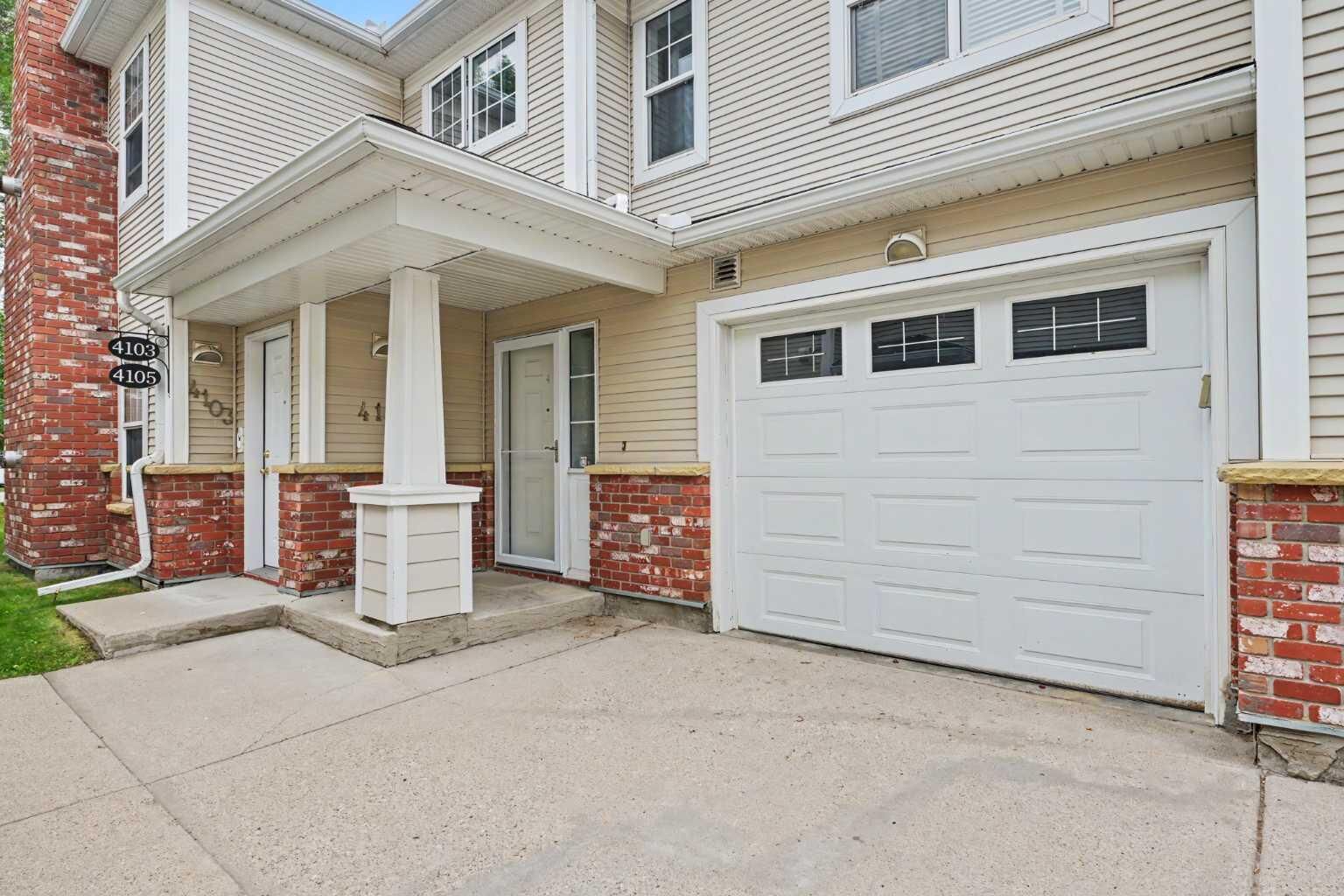 Property Photo:  7171 Coach Hill Road SW 4105  AB T3H 3R7 