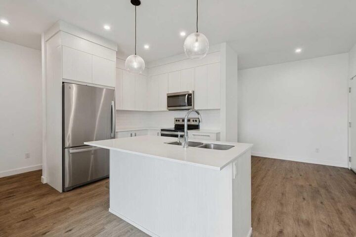 Property Photo:  681 Savanna Boulevard NE 1415  AB T3J 5N9 