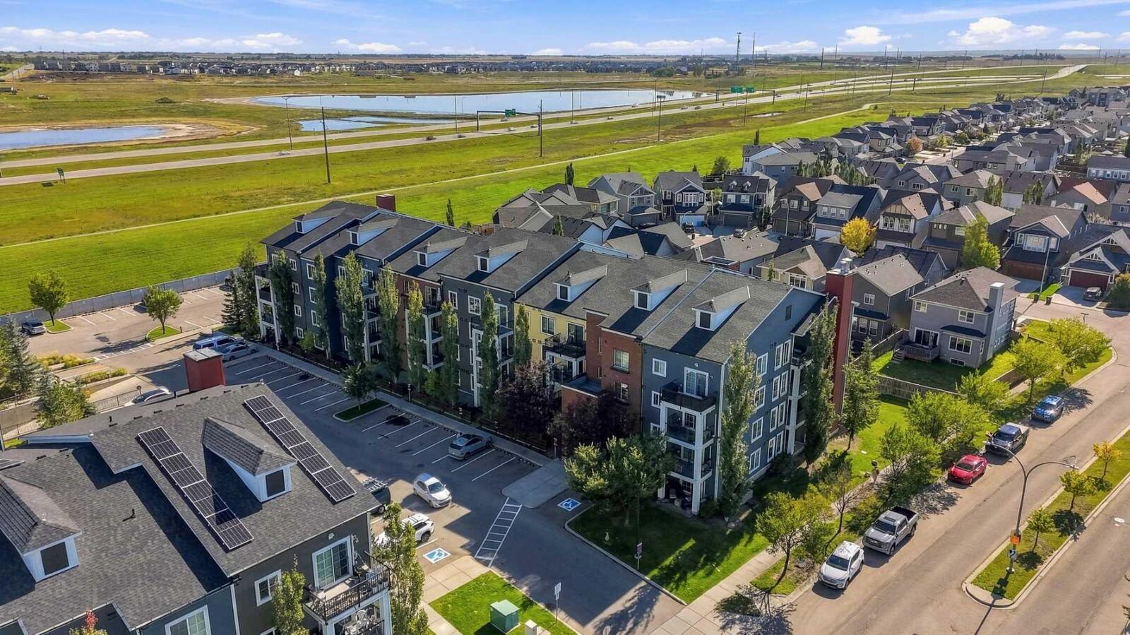 Property Photo:  755 Copperpond Boulevard SE 1306  AB T2Z 4R2 