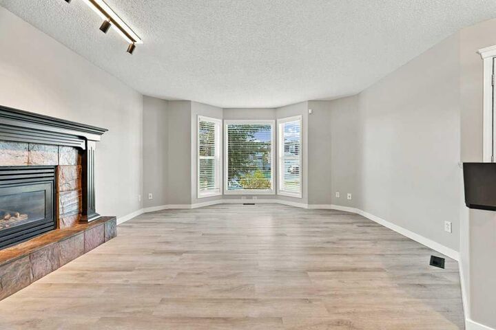 Property Photo:  334 Bridlewood Court SW  AB T2Y 3T6 