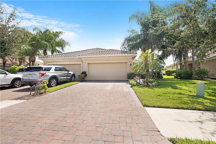 Property Photo: 2034 Tamarron Ln FL 34120
