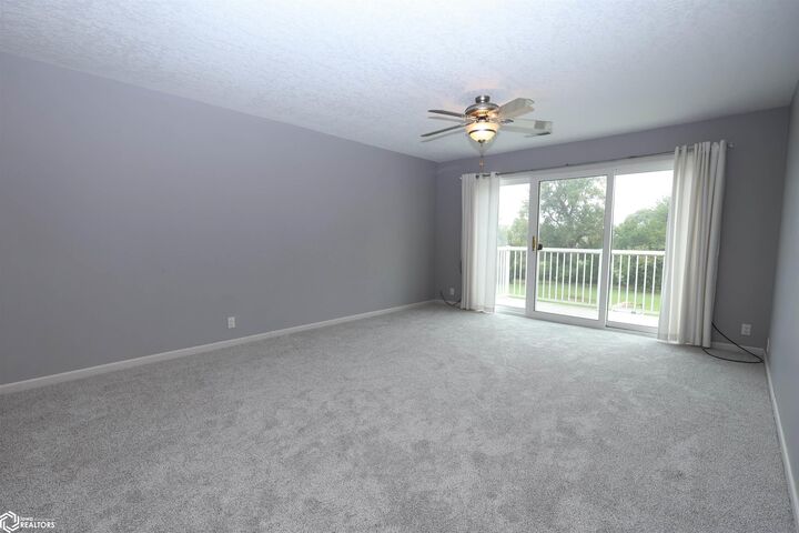 Property Photo:  514 E Olive Street 207  IA 50158 