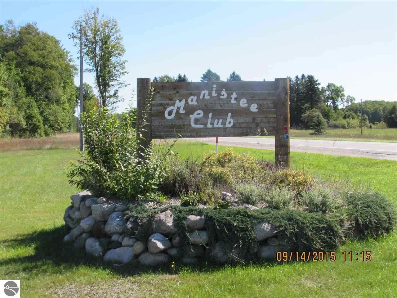 Property Photo:  100 Eric Drive  MI 49646 