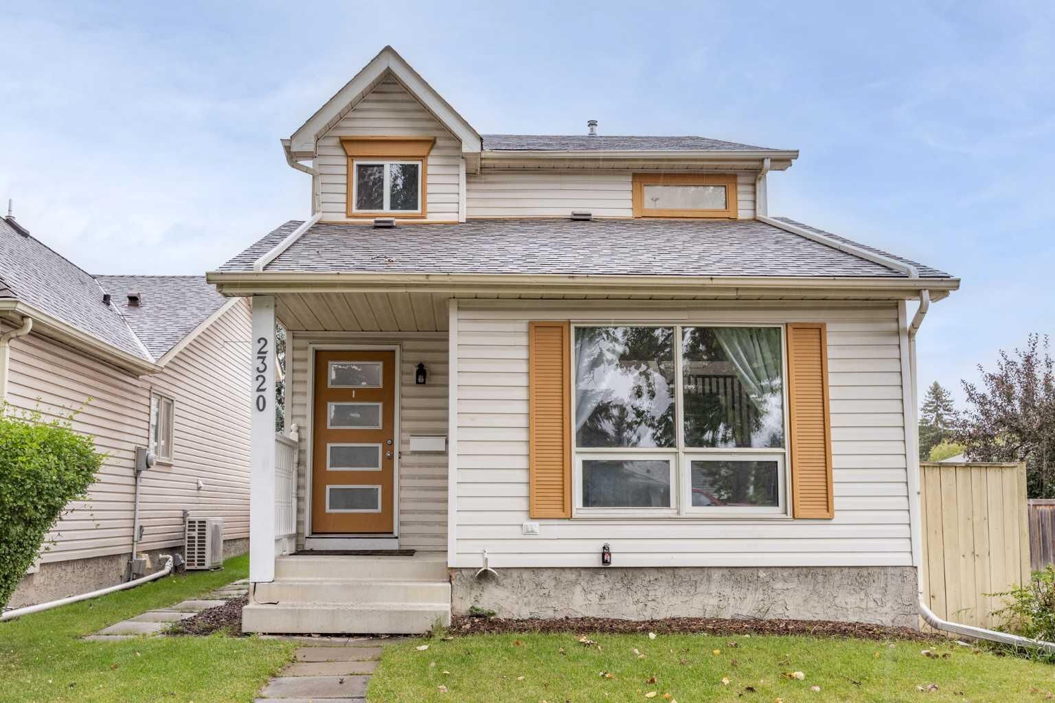 Property Photo: 2320 Woodview Drive SW AB T2W 4X6