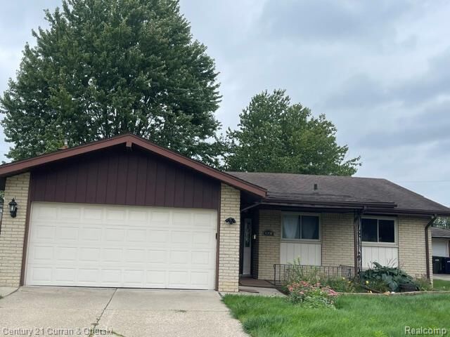 Property Photo:  12156 Corvair Drive  MI 48312 