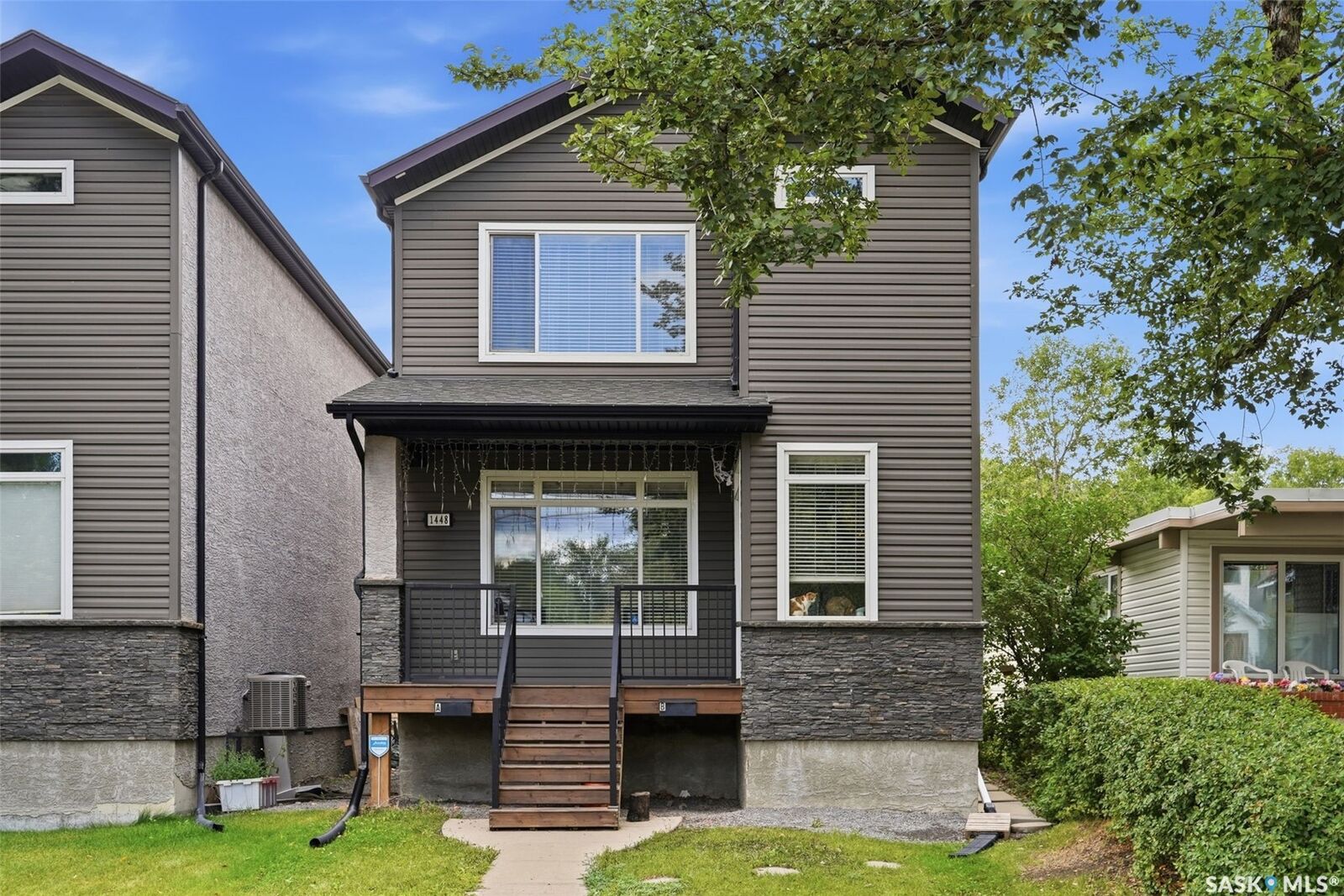 Property Photo: 1448 McIntosh Street SK S4T 5C3