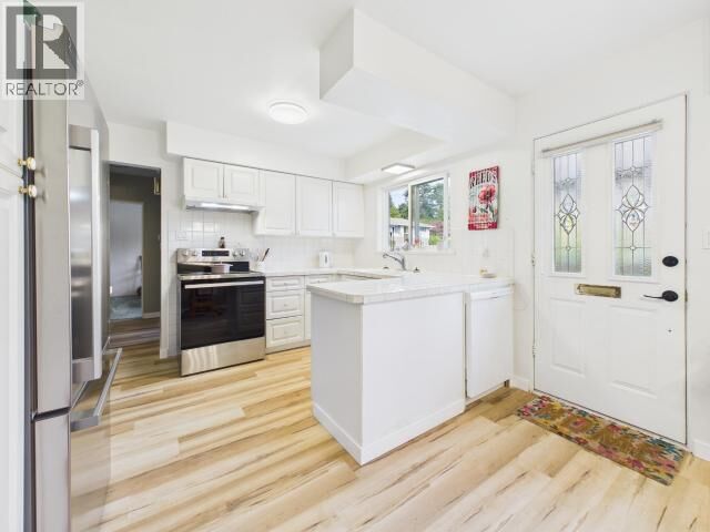 Property Photo:  7110 Tahsis Street  BC V8A 1G5 
