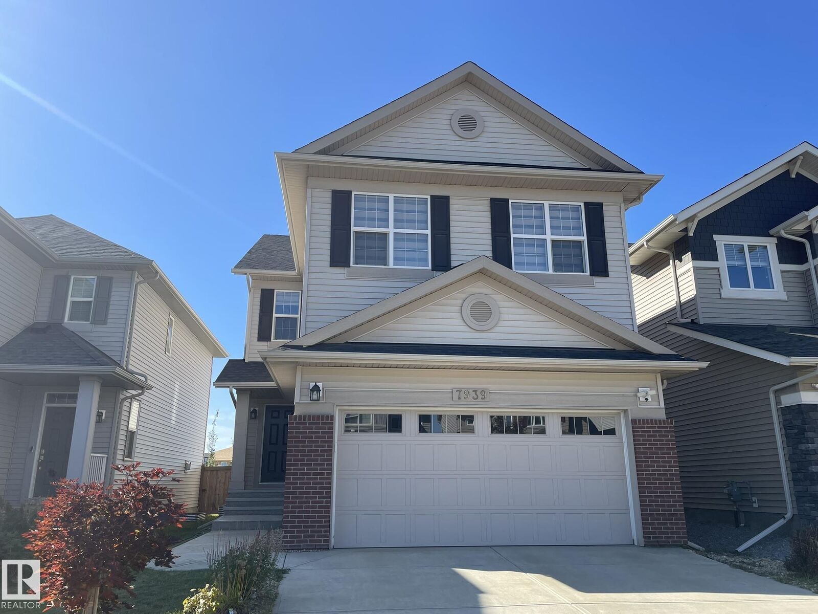 Property Photo:  7939 Erasmus Crescent NW  AB T6M 0S2 
