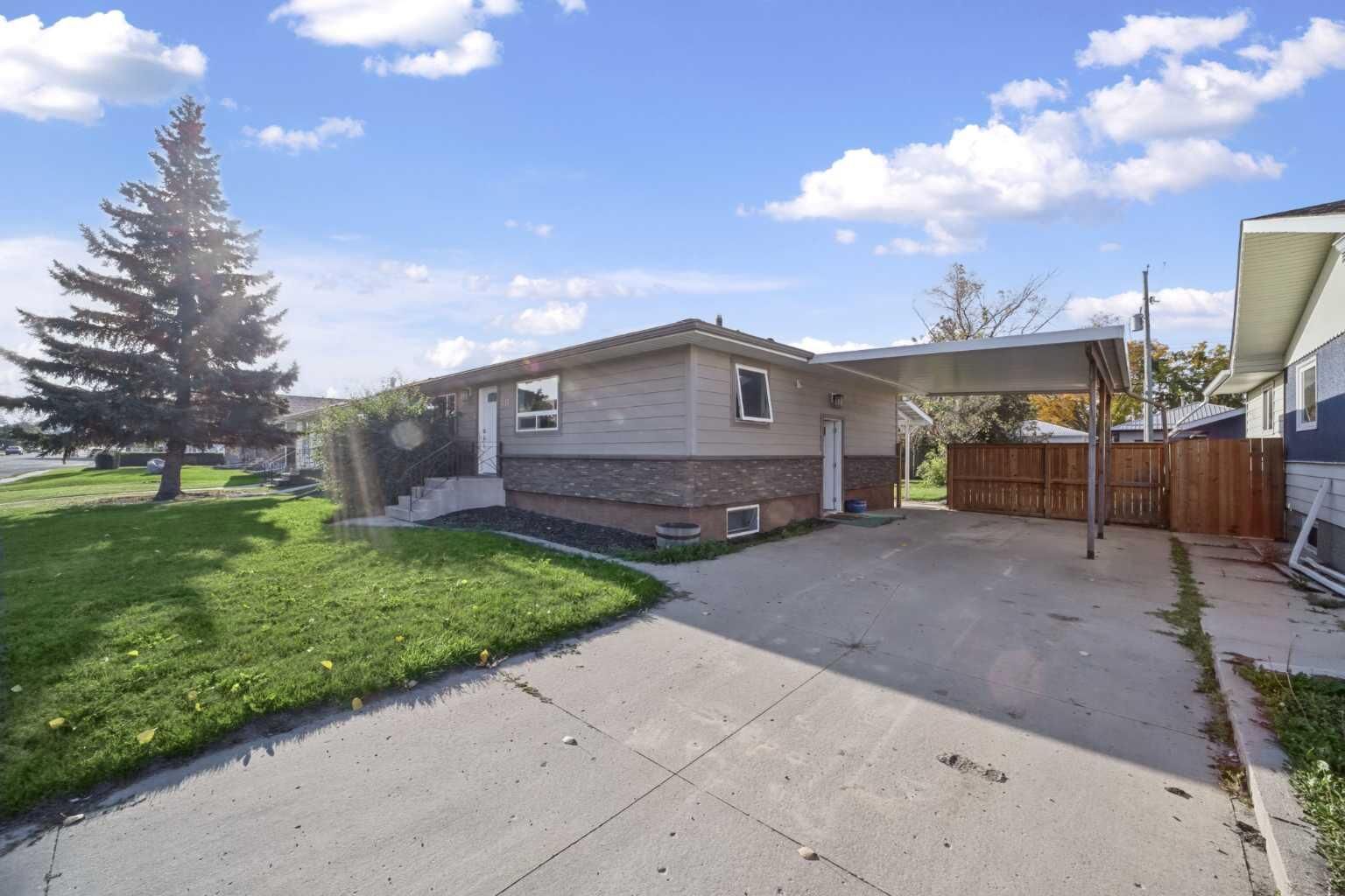 Property Photo:  5313 50 Street  AB T4H 1H6 