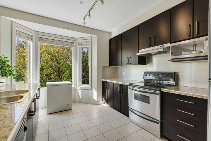 Property Photo:  830 Centre Avenue NE 302  AB T2E 9C3 