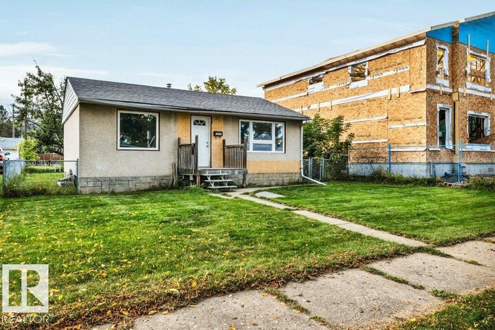 Property Photo:  12210 49 Street NW  AB T5W 3A8 