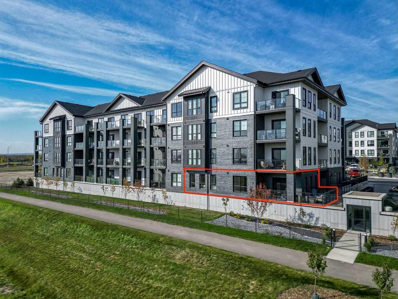 Property Photo:  100 Banister Drive 4110  AB T1S 5Y5 