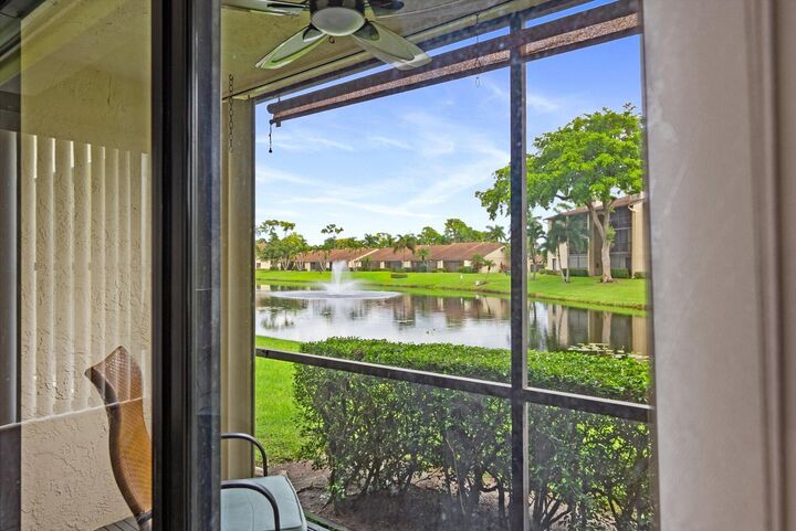 Property Photo:  722 Sunny Pine Way F1  FL 33415 