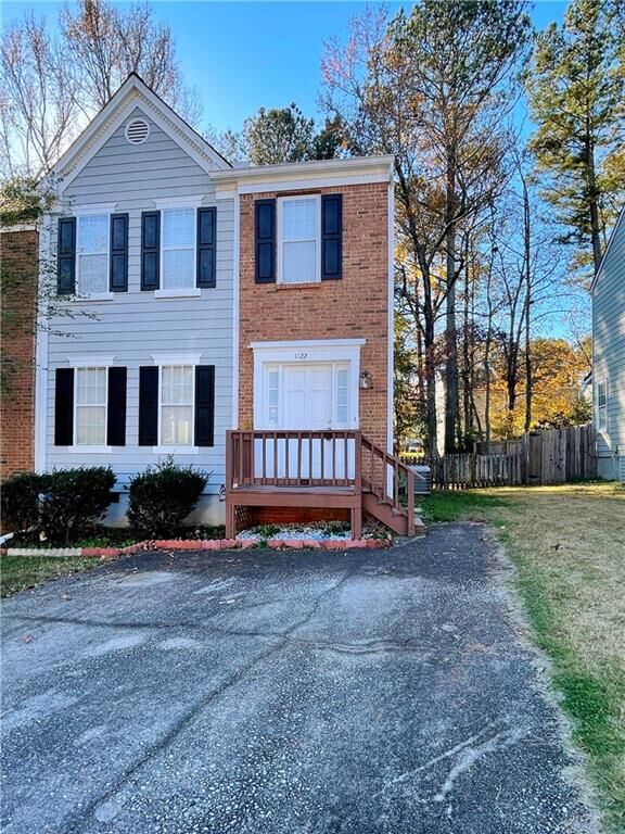 Property Photo:  1122 Overland Hill Trace  GA 30093 