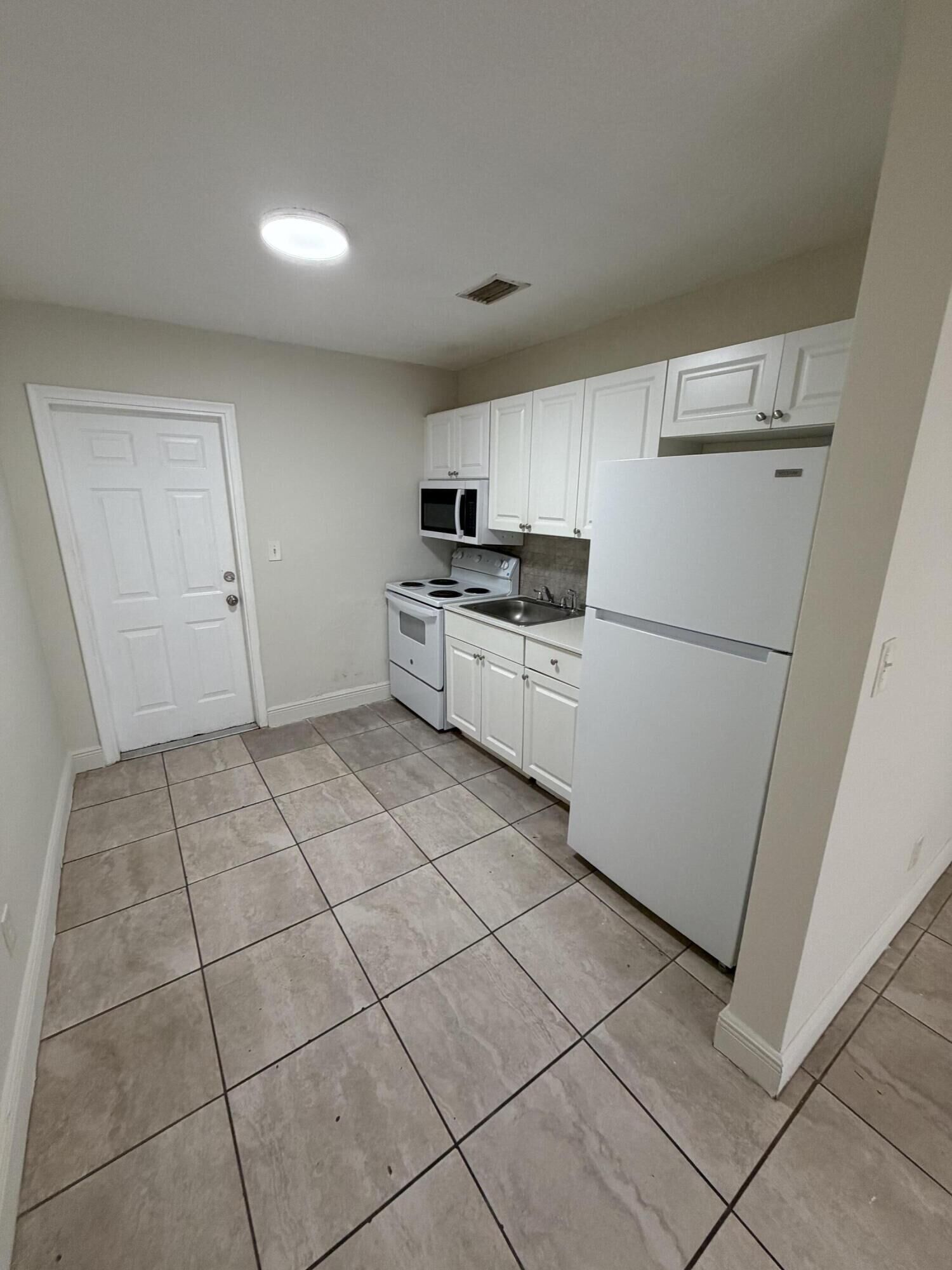 Property Photo:  4141 SW 20th Street 1-5  FL 33023 