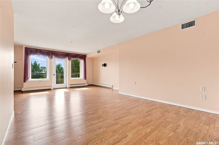 Property Photo:  1622A Acadia Drive 311  SK S7H 5H7 