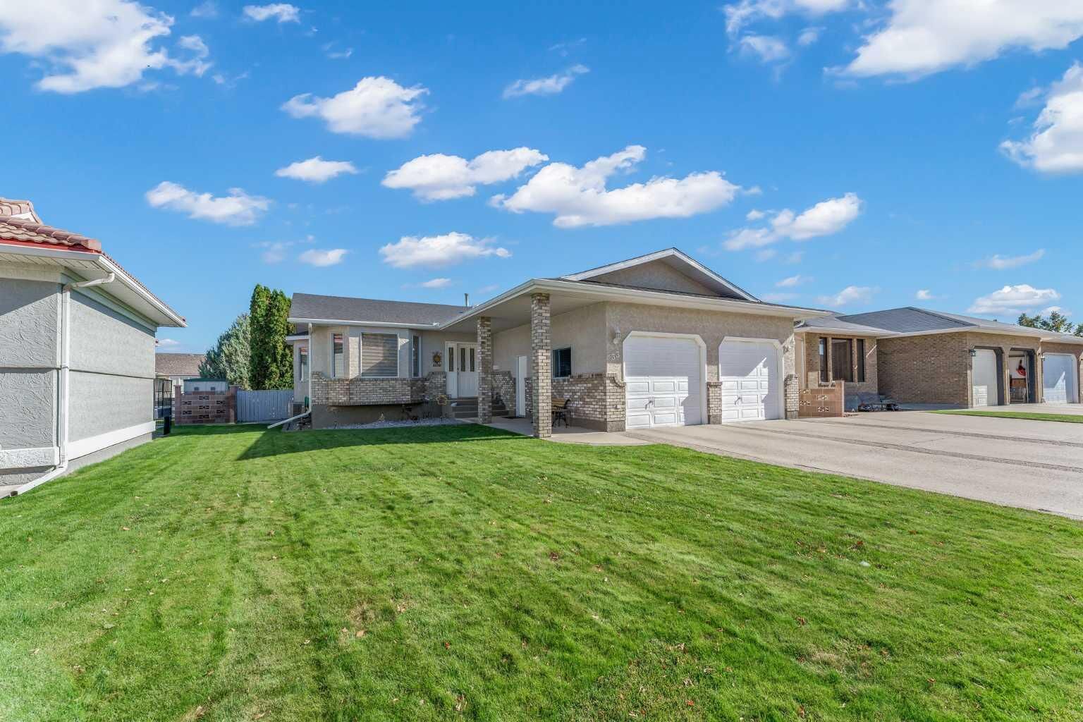 Property Photo:  33 Park Meadows Drive SE  AB T1B 4C3 