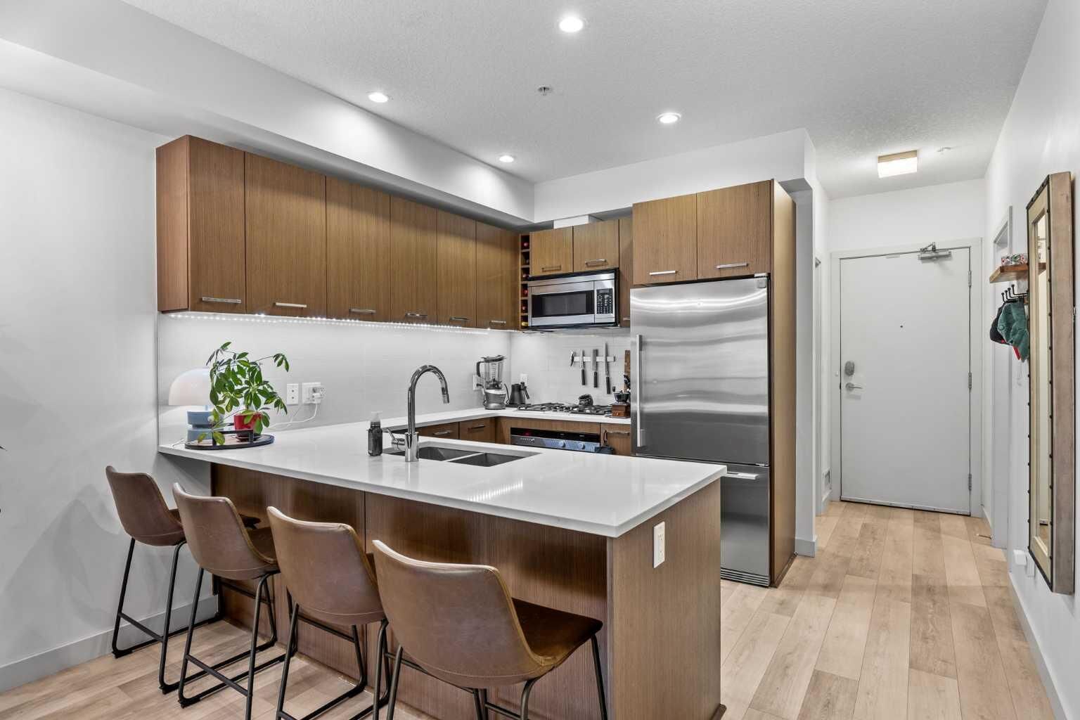 Property Photo:  323 20 Avenue SW 218  AB T2S 2G5 