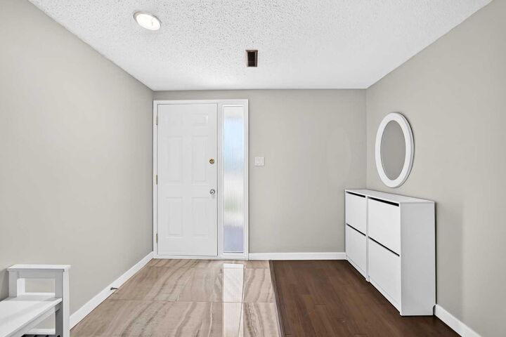 Property Photo: 10304 Braeside Drive SW AB T2W 1B4