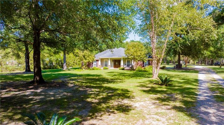 Property Photo:  15020 Private Road 368  AL 36608 