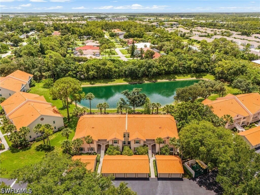 Property Photo:  305 Robin Hood Circle 204  FL 34104 