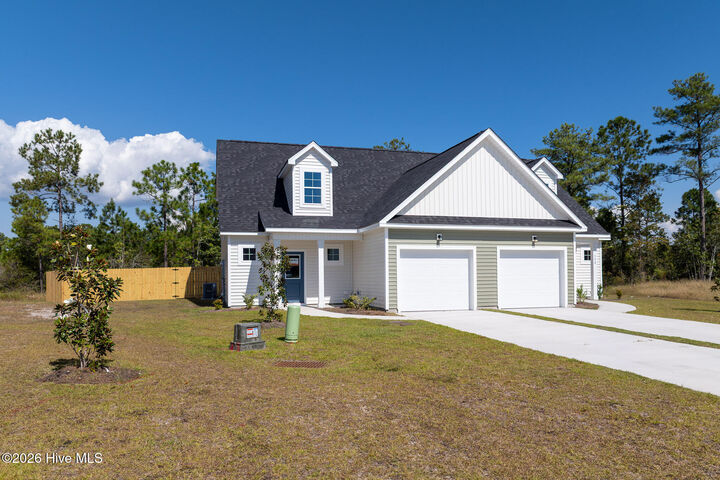 Property Photo:  305 Coastal Reef Court  NC 28445 